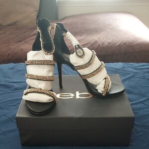 Bebe Black and Gold Heels with Chic Design